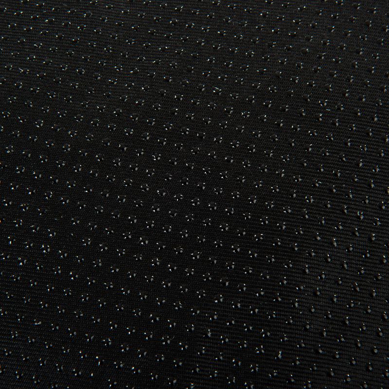 Black fabric with non-slip studs, suitable for secure placement of pet accessories.