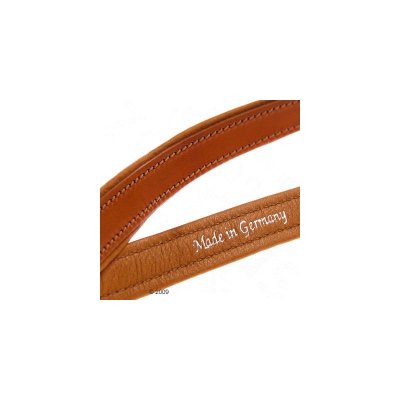 Brown leather product with white lettering 'Made in Germany'.