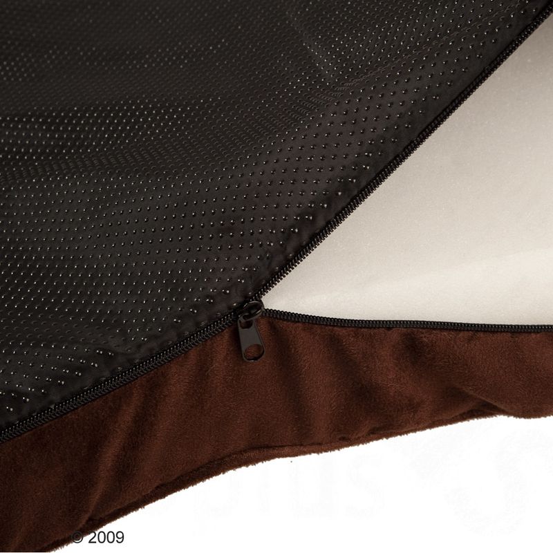 Close-up of a brown pet cushion with removable cover, zip and non-slip underside.