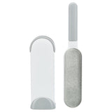 Lint brush with grey handle and white storage case, suitable for removing pet hair.