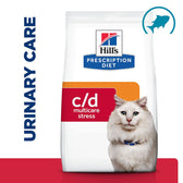 Hill's Prescription Diet c/d multicare stress food packaging with urinary care text and fish icon visible.