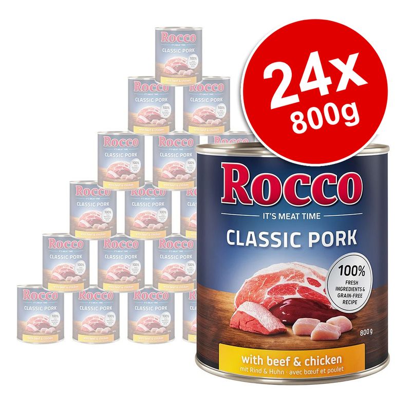 Rocco Classic Pork with beef & chicken, 24 x 800g tins. Label shows 100% fresh ingredients & grain-free recipe. Large can in front, stacked cans behind. Red badge: 24x 800g.