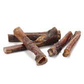 Several dried beef chew sticks, natural dog snacks with no visible additives.