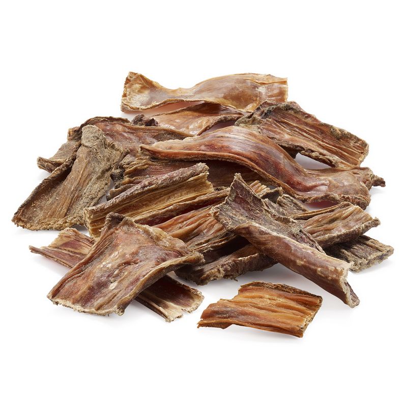 Pile of dried meat strips shown on a white background, displaying the product’s texture and size for treat or snack use.