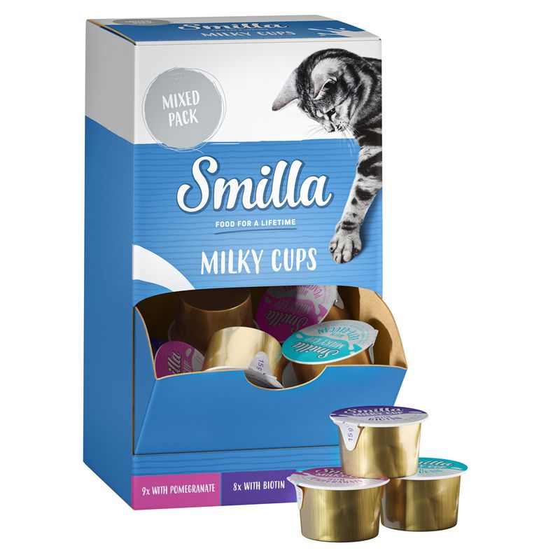 Smilla Milky Cups mixed pack. Contents: 9x with pomegranate, 8x with biotin. Packaging shows cat and golden cups with lids in various colours.