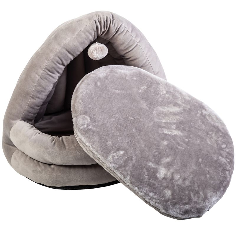 Grey, cave-shaped pet bed with removable soft cushion and hanging pompom toy.