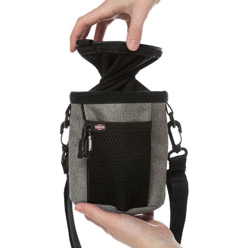 Trixie treat pouch with mesh compartment, grey design, hand opening lid. Practical for dog training or walks.