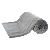 Grey, rolled-up towel made of soft fabric, suitable for versatile use.