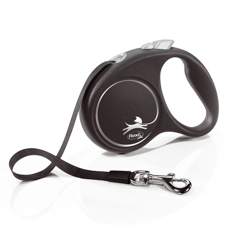 Flexi dog lead in black with ergonomic handle, silver logo and adjustable strap. Metal carabiner for attachment visible.