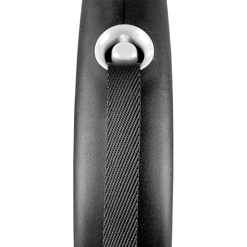 Close-up of a black dog lead strap with textured fabric and silver attachment ring.