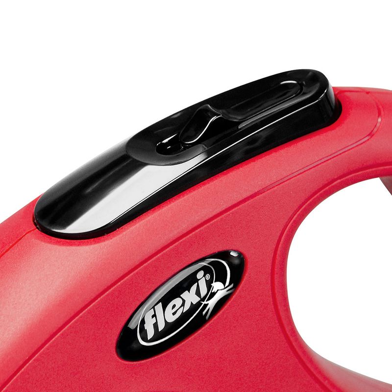 Flexi dog lead in red with black handle and logo print. Close-up view of the locking mechanism.