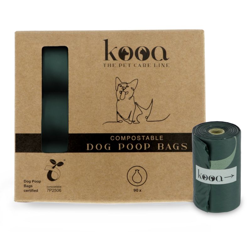 Box of 90 compostable dog poop bags with certification mark and one roll shown outside the box. Text on packaging highlights compostable feature and pet care line branding.