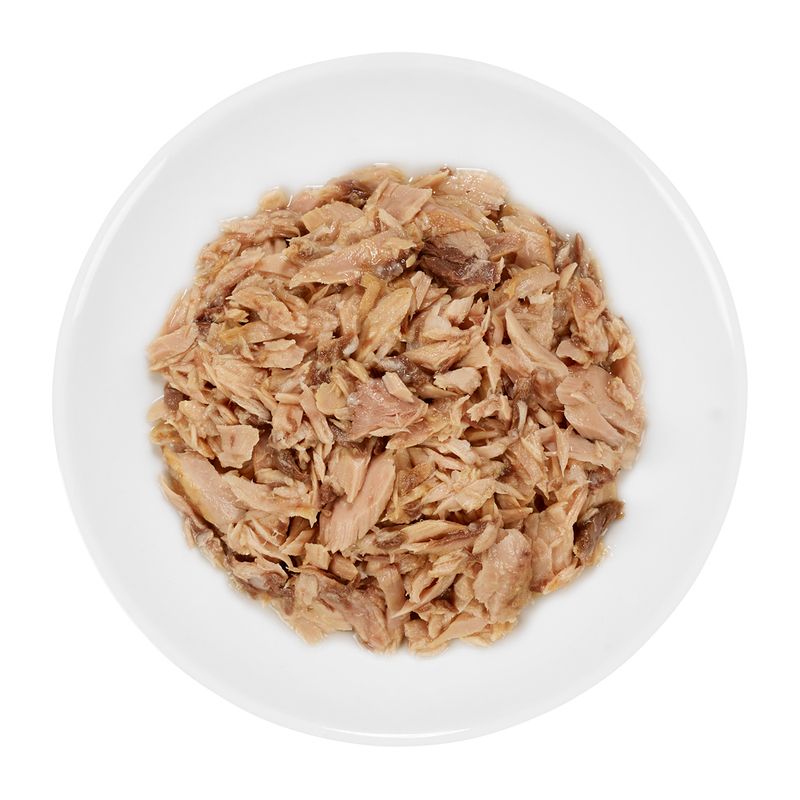 Bowl filled with shredded meat, showing the texture and appearance of the wet food product.