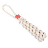 Braided toy made of beige rope with red plastic detail and loop at the end.