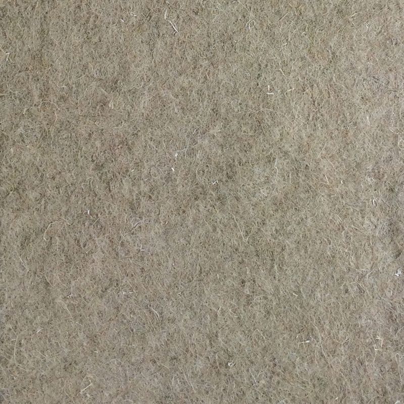 Close-up of a beige-brown felt surface, material texture visible.