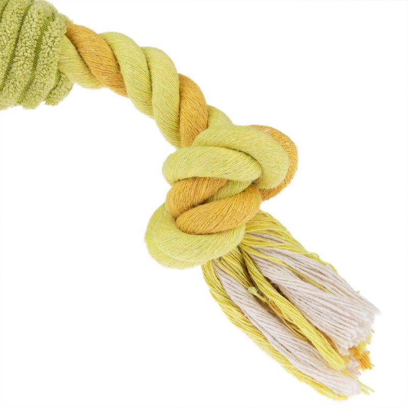 Toy made of braided rope in yellow and white with knots and tassels at the end.