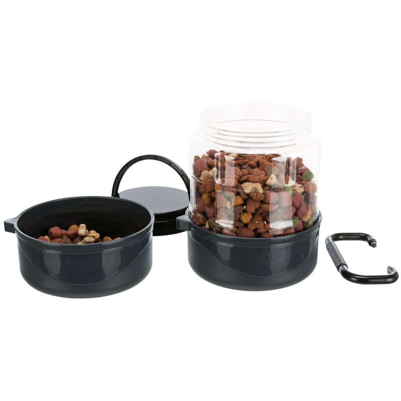 Plastic food container with removable lid, filled with dry food. Includes two bowls and a carabiner for attachment.