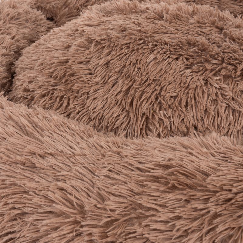 Close-up of brown, fluffy material, possibly suitable for pet beds or blankets.