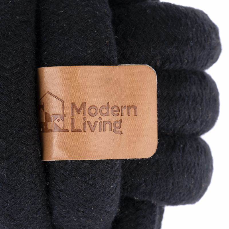 Modern Living. Black fabric with brown leather label and embossed logo.