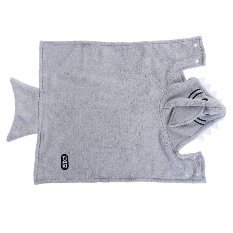 Grey towel with hood in shark design, visible Trixi brand on the front. With press studs on the sides.