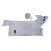 Grey towel in shark shape with Trixie logo, includes rolled-up towel. Visible details: fins, teeth and eyes of the shark.