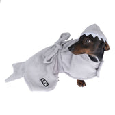 Dog in grey bathrobe with shark design and Flectalon logo, suitable for pets after bathing.