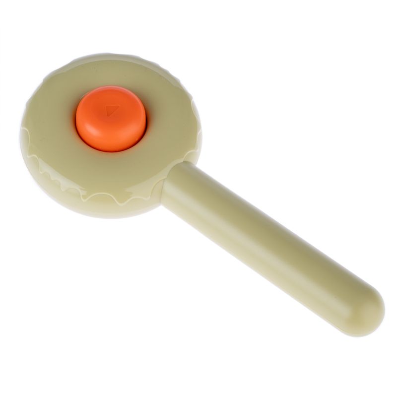 Handy clicker with orange button for training or interaction, beige plastic housing.