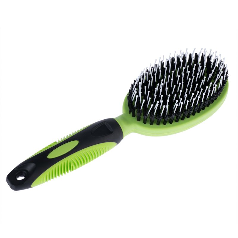 Green brush with black bristles and white tips, ergonomic handle with non-slip elements.