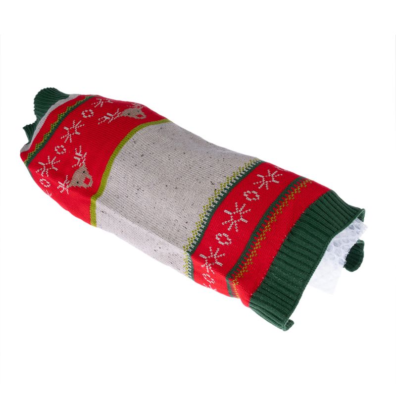 Red and green knitted cover with reindeer and snowflake pattern, suitable for bottles or similar items.