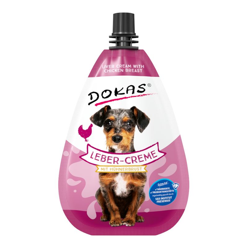 Dokas liver cream with chicken breast, tested by SGS Institut Fresenius. Pink and white packaging with dog motif.