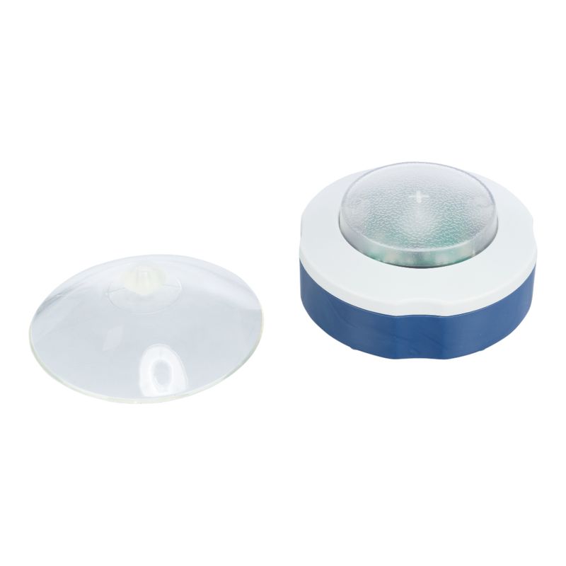 Two parts of an LED lighting system: a transparent suction cup cover and a blue-white housing with a clear dome.