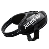 Black Julius-K9 IDC Power dog harness with reflective stitching and sturdy fastener.