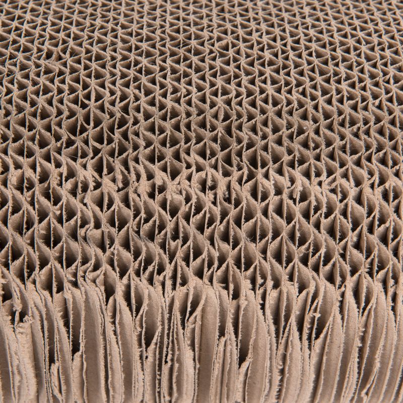 Close-up of corrugated cardboard with honeycomb structure, suitable for scratching surfaces or packaging material.