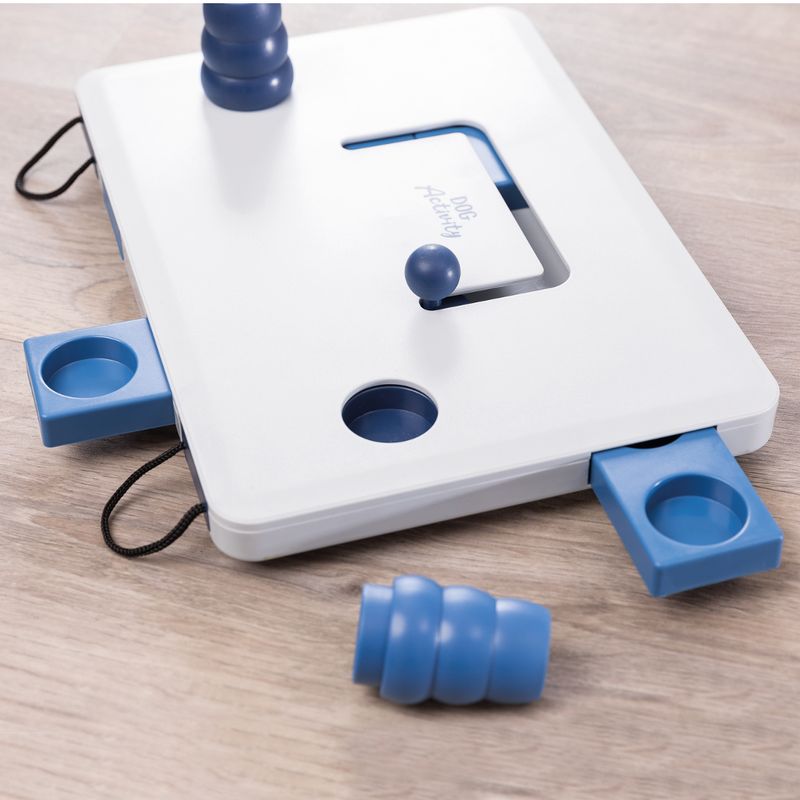 Interactive toy with sliding compartments and blue elements, 'Dog Activity' inscription visible. Suitable for dexterity exercises.
