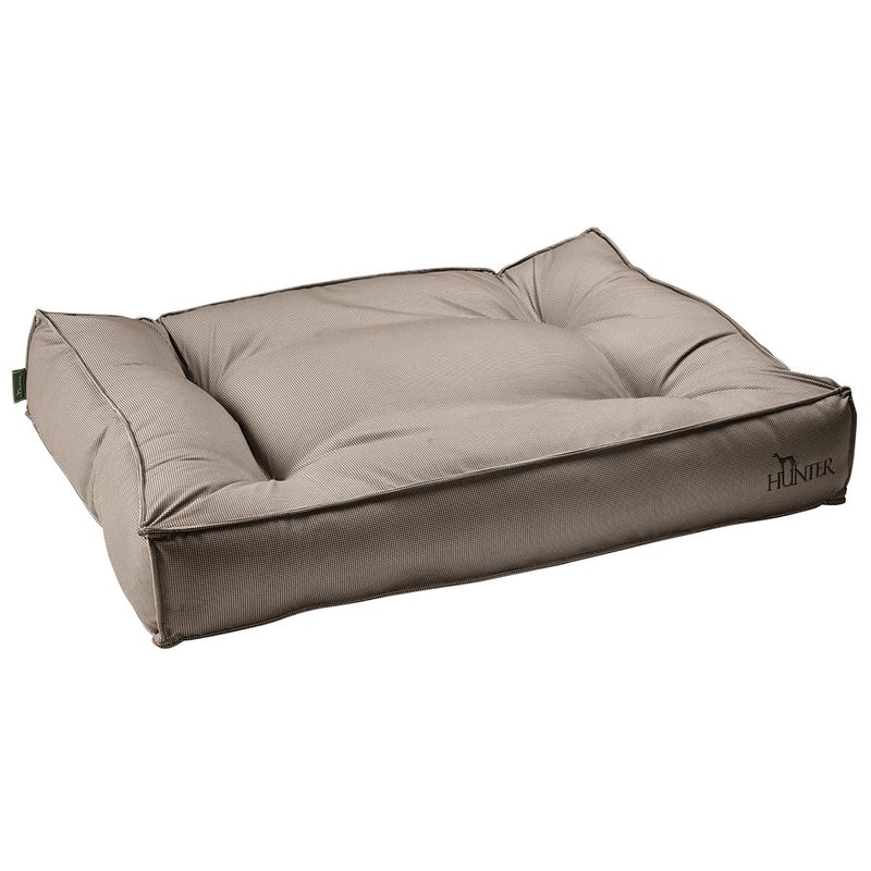 Dog bed in beige with padded sides and 'Hunter' logo on the front.