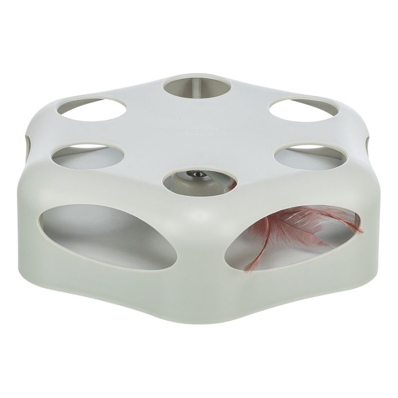 Interactive cat toy with holes and a feather inside that is visible.