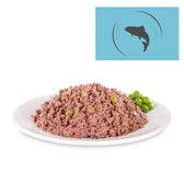 Close-up of wet food with green peas on a white plate. Fish symbol on blue background in the top right.