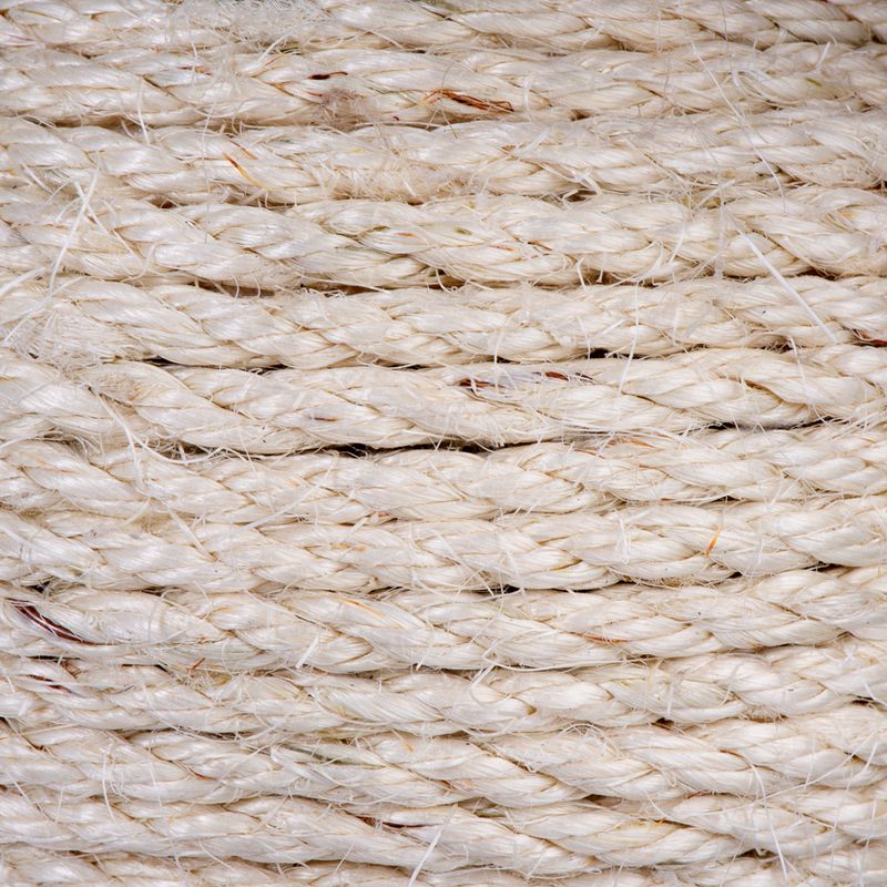 Close-up of natural-coloured sisal rope, braided and sturdy.