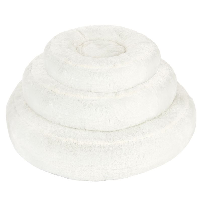 White, round plush bed with three tiered rings, suitable as a sleeping place or lounging surface.