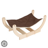 Wooden hammock with brown fabric cover, suitable for small pets. Round wooden frame and stable base visible.