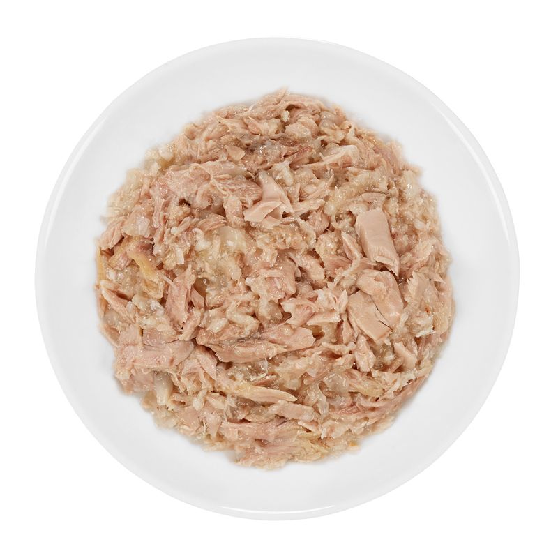Close-up of shredded, cooked meat on a white plate, shown as product content.