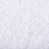 Close-up of white crystals, possibly salt or minerals. No further information visible.