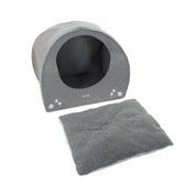 Grey pet house with round entrance and removable, soft cushion. Decorative dots visible on the front.