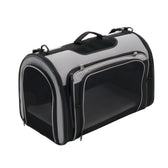 Transport bag made of grey and black material with mesh windows, carrying handle and zips. Suitable for safe transport of pets.