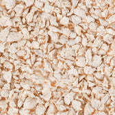Close-up of light, dried flakes. Product image shows the texture and shape of the flakes.