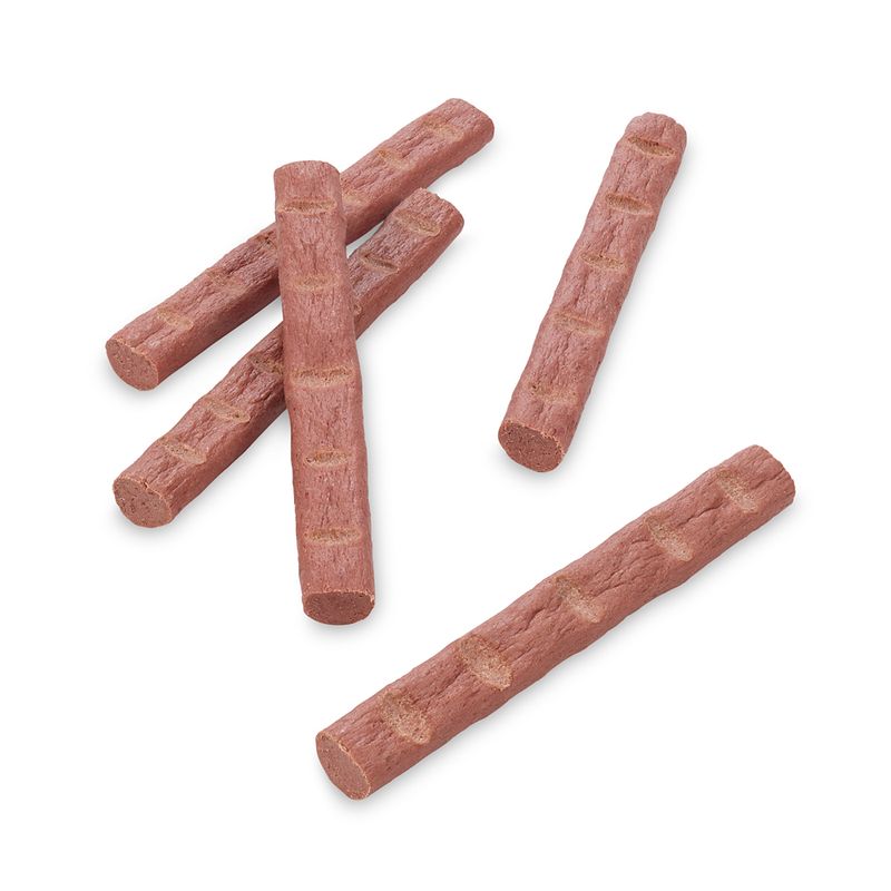 Five flesh-coloured snack sticks with a ridged surface, suitable as treats or rewards for pets.