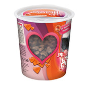 Tub of pet food with heart-shaped window showing chunks inside and label stating 'with animal proteins', 125g net weight.