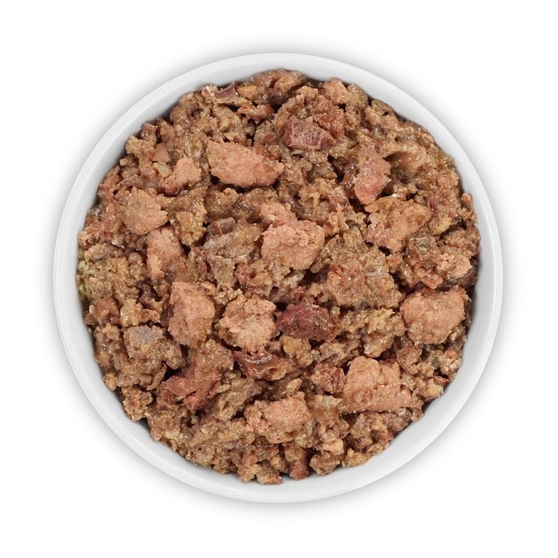 Bowl with moist, shredded pet food in brown and flesh-coloured tones.