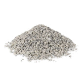 Grey, granular cat litter in a small pile, suitable for use in litter trays.